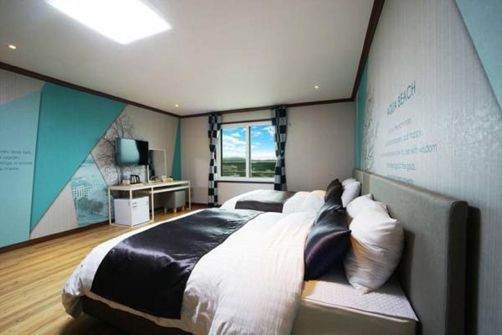 Seongsan Aqua Beach Hotel Seogwipo Rom bilde
